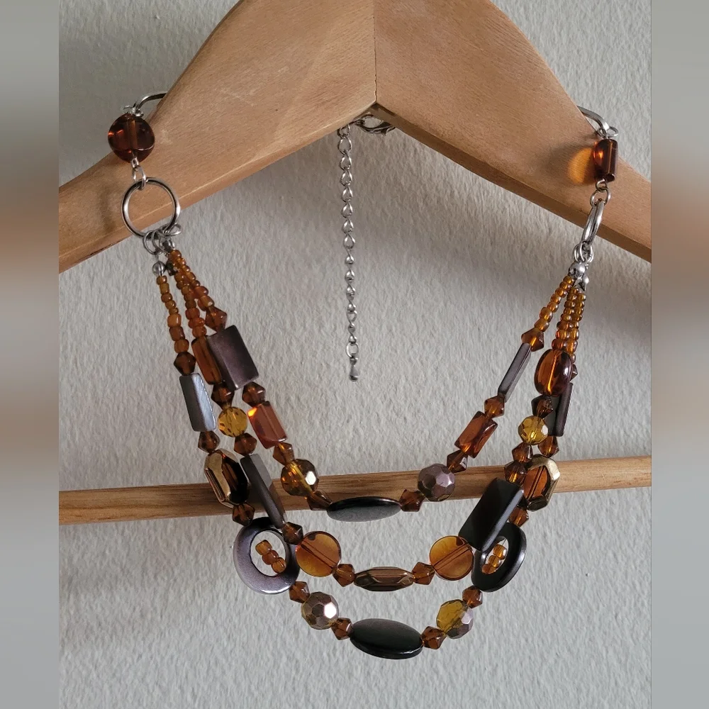 Multi strand silver and amber beaded necklace